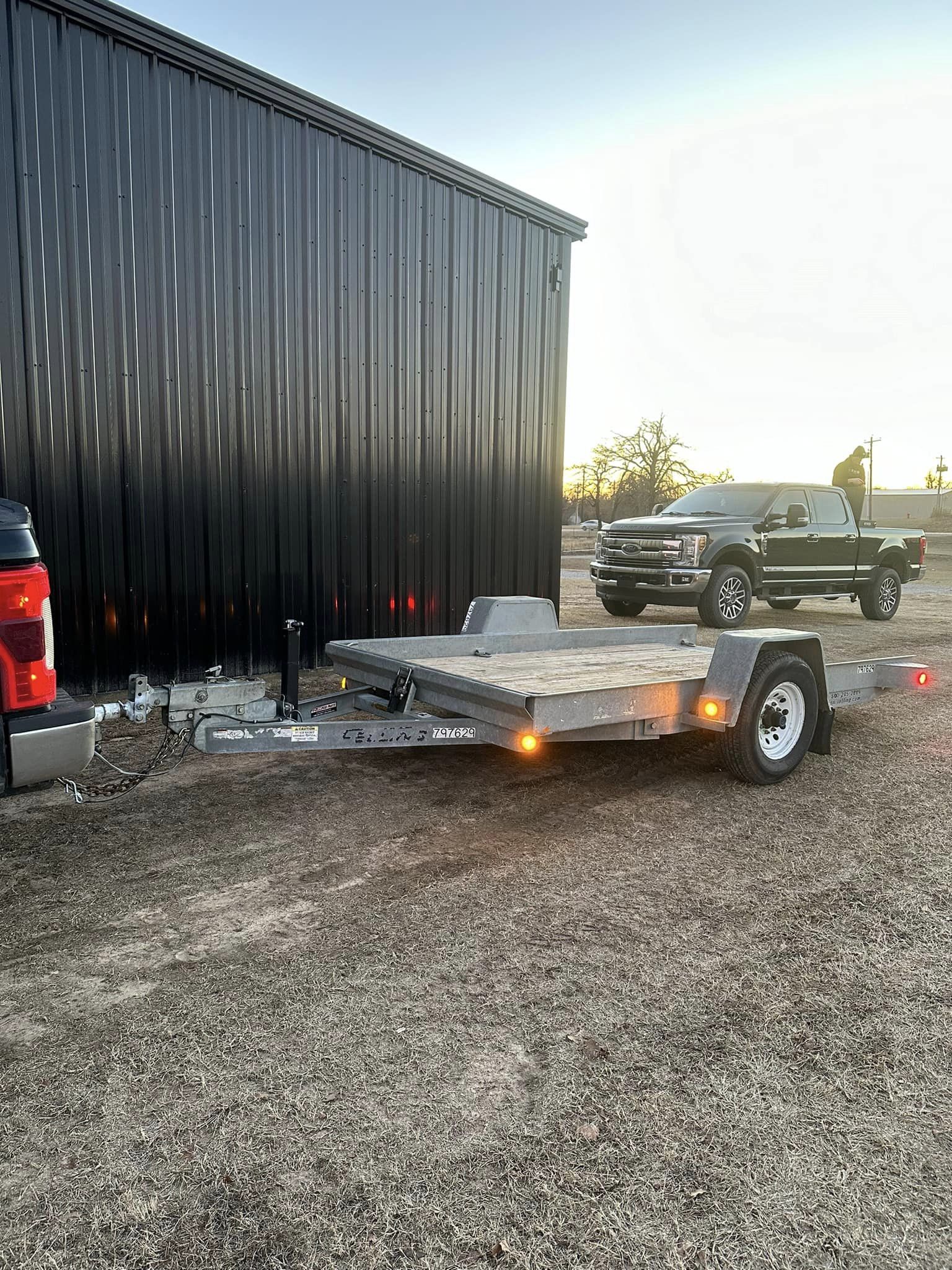 SOLD-12’ Felling commercial Tilt deck trailer.